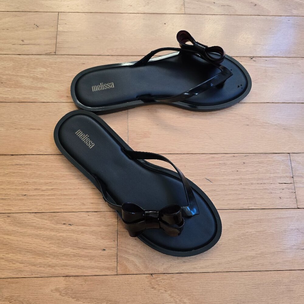 Melissa | Harmonic Eclipse black tortoise shell jelly flip-flop sandals | WMS 8